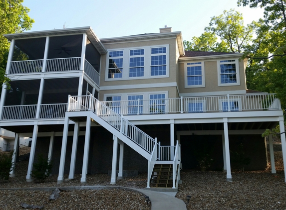 Partners Construction LLC - Camdenton, MO. Deck addition added to the right. Plus wrapped all the posts and rim of the screened deck on the left. An awesome addition!!!