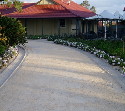 Ozpave (Aust) Pty Ltd. White Quartz Two Coat Decorative Seal