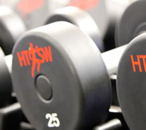 Health Track Sports Wellness - Glen Ellyn, IL. Lift weights in our free weight area!