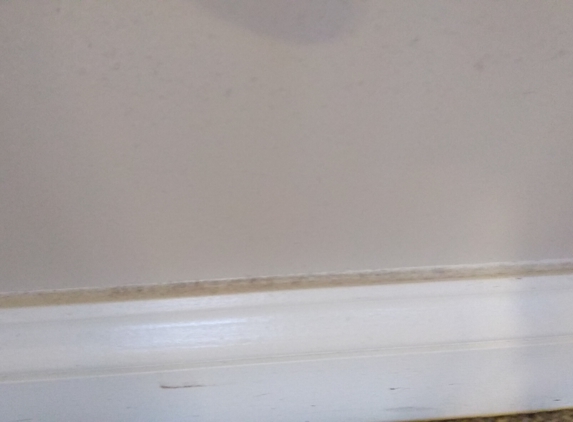 Tidy Maids House Cleaning - Woodbridge, VA. Dusty wall and baseboard after cleaning
