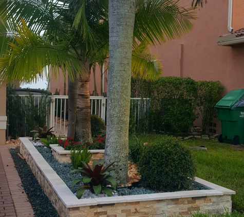 Top Green Landscaping - Pembroke Pines, FL. Top green veneer Stone borders