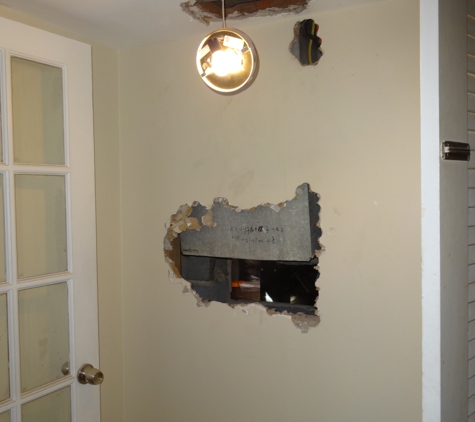 BELTWAY Kitchen and Bath 2 - Arlington, VA. Tore into sections of the house not under remodeling to access stuff and left it like this.
