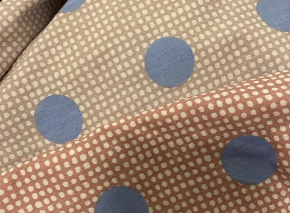 Six Star Dry Cleaners - Forest Hill, VIC. Dress colour when returned compared to scrap of the fabric