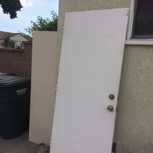 A Dan The Handyman - Santa Ana, CA. This door was removed to be replaced 