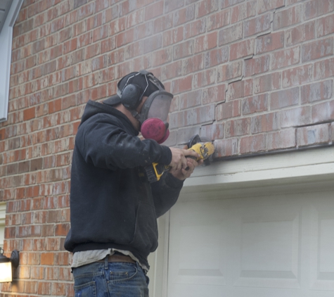 United Structural Systems, Inc. - Pleasant View, TN. Bricks cracking above the garage? We do brick and lintel repair, too!