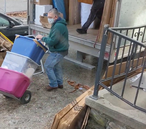 American Standard Moving - Affordable Long Distance Movers!. No ramp on van, my dad (65 y.o., in green) doing the moving, the driver (in black, no mask) passing stuff down