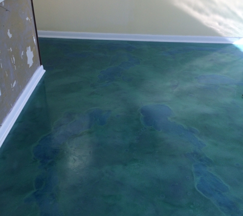 Decorative Concrete Designer. Concrete epoxy flooring welcomes rental guest at condo in Panama City Beach, FL.