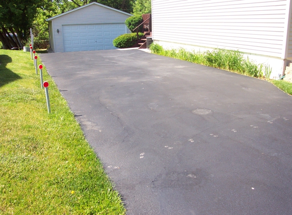 Still Sealcoating - Mukwonago, WI. They will destroy a nice driveway!