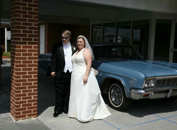 Bella Bridal - Winchester, VA. Me and my New Husband with our 
get-away car (66' impala)