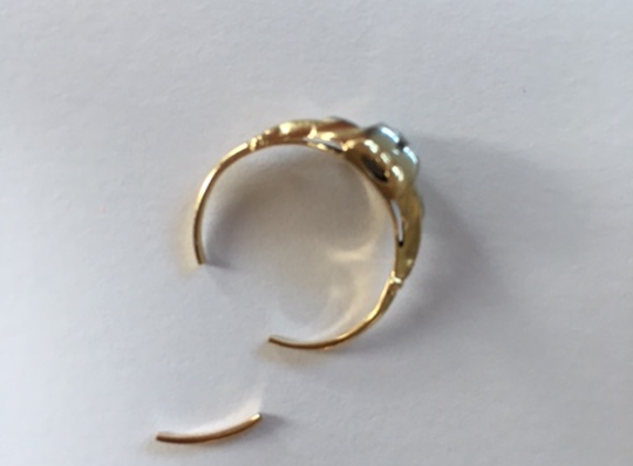 D.J.'s Goldmine Jewelry Outlet - Pembroke, MA. Ring broken where resizing was done