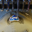 Creative Designs & Embroidery - Embroidering Machines
