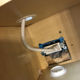 Absolute Home Renovations - N Royalton, OH. Electrical put in wrong cabinet for microwave that needs to be removed and large holes in cabinets by Anthony Hartman of Absolute Home Renov