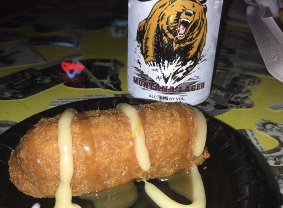 Winner's Pub - Sidney, MT. Fried Twinkie with Carmel and vanilla drizzle.