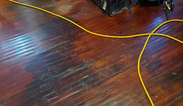 Arnold's Hardwood Floor Sanding. before