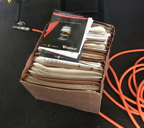 Snap Fitness - Columbia, SC. Box of files out in the open with member's personal information