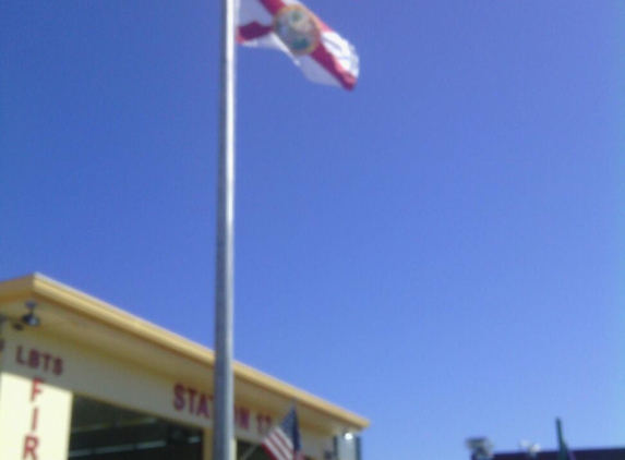 A 50 Star Flags Signs & Flagpoles - Hallandale Beach, FL. Fire Station. Lauderdale By The Sea.