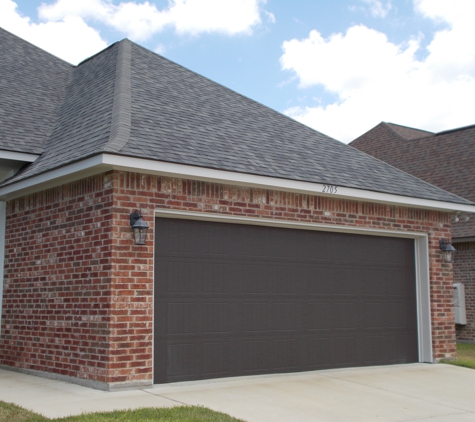 zion painting & Drywall llc - Shreveport, LA. Garage Door Painted