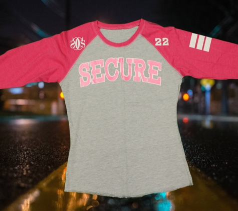 Secure Cultures, L.L.C. - Raleigh, NC. Heather Gray and Pink Pretty Girl Secure raglan. $25 online