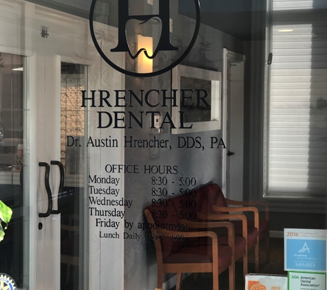 Hrencher Dental - Dodge City, KS. Signage on glass pane at Hrencher Dental Dodge City