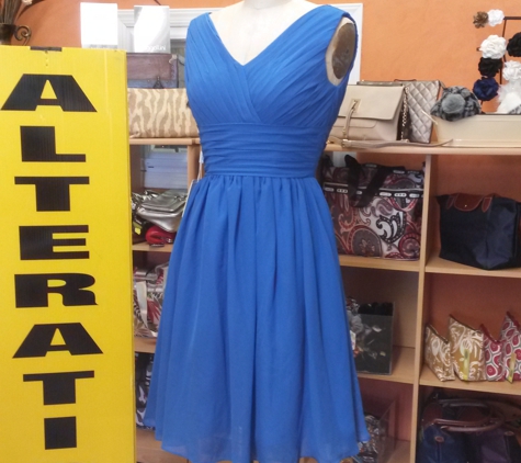 Zaraz Collection - Lynbrook, NY. alterations on this beautiful blue dress for Sofia from Rockville Centre