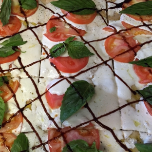 Plum Tomatoes Pizzeria & Restaurant - Mineola, NY