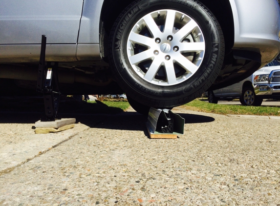 All Phases Home Services - Ann Arbor, MI. The Strongest No Clog Gutter System you'll see.  My Town & Country mini van resting on our cover system and the brackets didn't break.