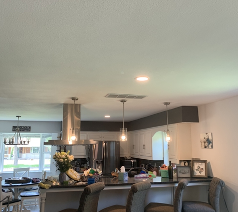Jeff Electric LLC - Richardson, TX. Two of the five can lights and pendant lights