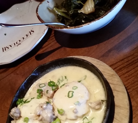 Succotash - Oxon Hill, MD. Best biscuits and gravy I've had and the collard greens with kimchi and country ham is a genius combination!