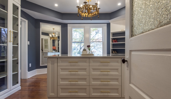 Bella Systems Philly. White walk in custom closet with shaker fronts and center island.