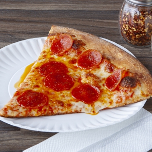 Winner's NY Pizza - Agoura Hills, CA. Delicious big slice of pepperoni; grease down the wrist and all.