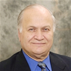 Dr. Manny E Christakos, MD