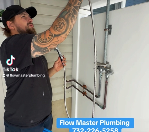 Flow Master Plumbing - Manahawkin, NJ. Installing a new outdoor shower unit