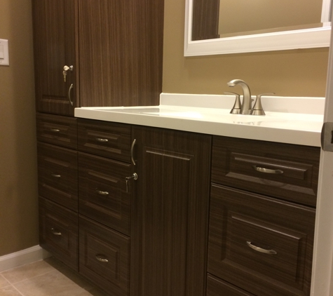 Cas Carpentry,Inc. - Brownstown, MI. Custom belt vanity and linen cabinetry