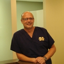 Bueker, Neil J. DDS - Dentists