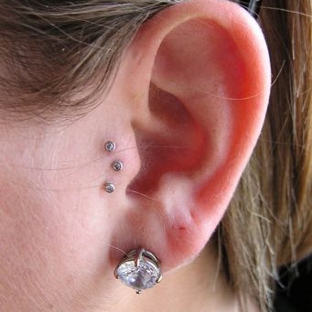 Pinky's Piercings & Fine Body Jewelry - Champaign, IL. Professional Body Piercing in a clean, safe, friendly place!