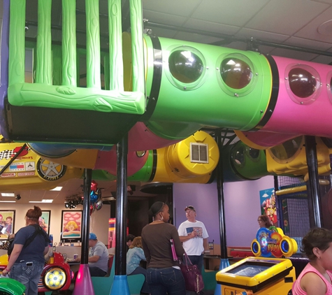 Chuck E. Cheese's - Oklahoma City, OK. They have a area where kids can play for free