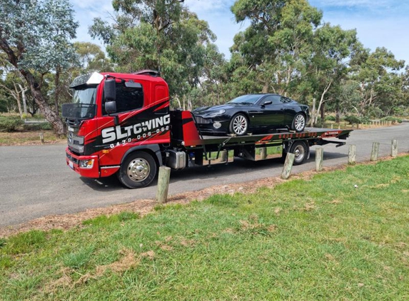 SL Towing Services - Hume, ACT. My Aston on the back of SL Towing tow truck