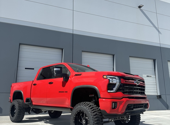 The Custom Shop - Las Vegas, NV. Chevy 2500HD on a 7” RC Lift, 20x12” Hostile Wheels, and 37” Tires