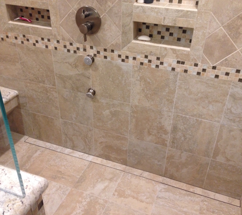 The Tile Stop Inc. - Allen Park, MI. We purchased a linear drain from Tile Stop as well for a zero entry shower! 
