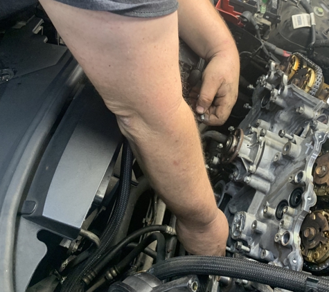 Wesley's Performance Auto Service And Repair - lenoir, NC. REMOVE & REPLACE TIMING CHAIN ON 2009 CADILLAC CTS SEDAN.