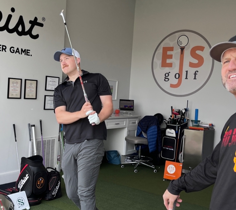 EJS Golf - Scottsdale, AZ. Student admiring his shot.