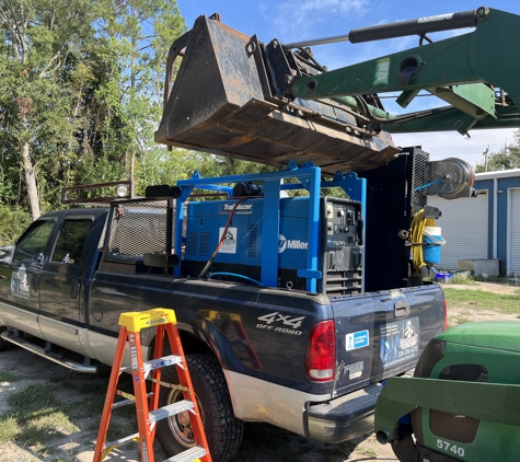 Cameron Fabrications, LLC - Gulfport, MS. Installing our Miller welder / generator on the skid.