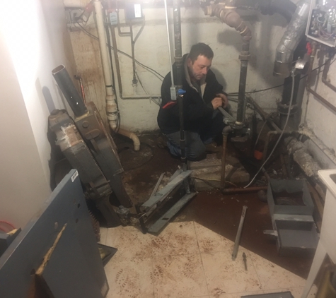 24 Hour Air Conditioning, Plumbing, Sewer and Drain - Freeport, NY. Replacing "cracked"3 section steam boiler. 