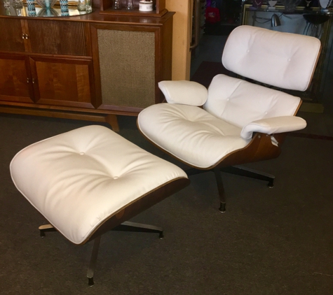 Classic House - Phoenix, AZ. This stunning Eames Lounge Chair with ottoman has been newly custom upholstered by our shop,, Classic House.