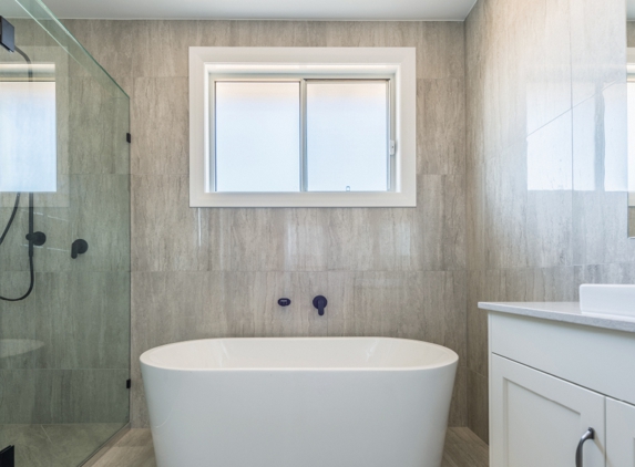 Bradnam's Windows & Doors - Mount St John, QLD. Frameless Shower Screen With black hinges