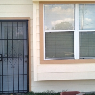 Eyo Ebiana - Houston, TX. Back access door installed with a locked screen door