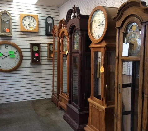 American Black Forest Clocks - Elgin, IL. We sell Grandfather clocks. We make housecalls to service Grandfatherclocks.
