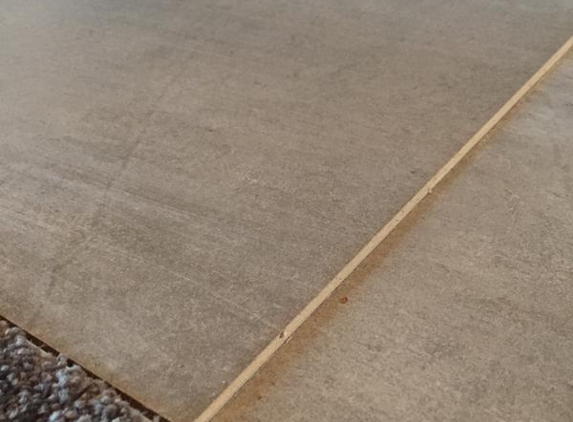 Gurenovation - Cranbourne North, VIC. Tile not straight and raised!