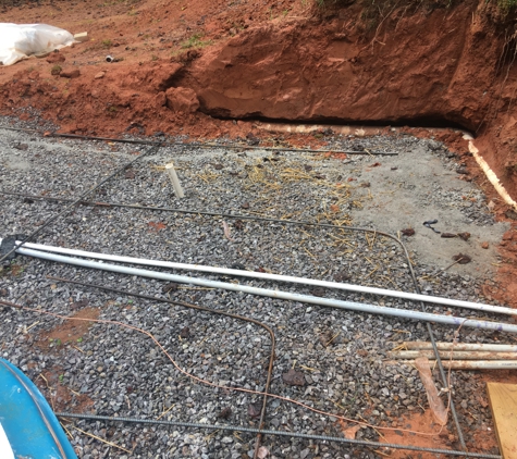 Chandler pool and spa - Candler, NC. New contractor had to rip up all the rebar and level this entire corner up