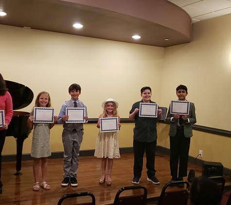 Stephen McCool's Voice and Piano Lessons - Norcross, GA. Proud students celebrating another year of piano studies.